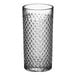 A close-up of an Acopa highball glass with a diamond pattern.