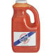 A jug of orange Crystal 1 Gallon Hot Sauce.
