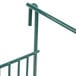 A Metroseal 3 green metal shelf with a green metal railing.