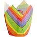 A colorful striped tulip baking cup with a rainbow design.