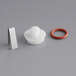 A Narvon front probe cap kit with a white plastic ring and a red rubber stopper.