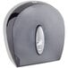 A black and white Pacific Blue toilet paper dispenser.