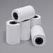 A group of Point Plus thermal paper rolls.