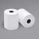A couple of Point Plus white thermal paper rolls.