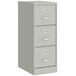 A light gray Hirsh Industries three-drawer vertical filing cabinet.