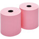Two pink Point Plus thermal paper rolls with holes.