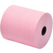 A close-up of a pink roll of Point Plus thermal paper.
