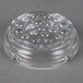 A clear glass Libbey Nob Hill ashtray with holes in it.