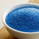 A bowl of Regal light blue sanding sugar.