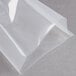 A clear plastic wrapper of ARY VacMaster chamber vacuum packaging pouches with a white lining.