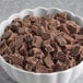 A bowl of Barry Callebaut dark chocolate chunks.