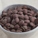 A bowl of Cacao Barry cocoa mass pistoles.
