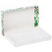 A white box with a lid and green holly design.