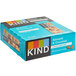 A blue box of 12 KIND Almond & Coconut Bars with black and white text.