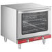 An Avantco stainless steel countertop convection oven with a glass door and a rack inside.