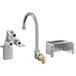 A Regency wall mount handsink faucet with a gooseneck spout and knee valve.