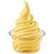 A clear cup of yellow Frostline Birthday Cake soft serve ice cream.