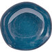 An indigo blue bowl with a small rim and white specks.
