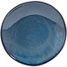 A Front of the House Artefact indigo porcelain bowl with a speckled surface.