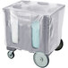 A Cambro granite gray plastic dish dolly with wheels and a cover.