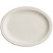 An Acopa ivory stoneware oval platter with a narrow white rim.