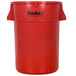 A red plastic Continental Huskee 44 gallon round trash can with black text.