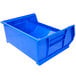 A blue plastic Metro stack bin with a lid.