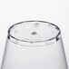 A clear plastic Fineline Savvi Serve squat tumbler with a small hole in it.