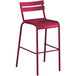 A red powder coated aluminum outdoor barstool with a white back.