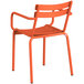 A Lancaster Table & Seating orange powder coated aluminum outdoor arm chair with legs.