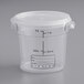 A clear plastic Vigor food storage container with measurements on it and a translucent lid.