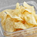 A plastic container of Good's Blue Original Kettle Cooked Potato Chips.