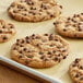 A close-up of a cookie with Enjoy Life semi-sweet vegan chocolate chips.