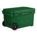 A Hunter Green CaterGator outdoor cooler with wheels.