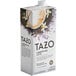 A carton of Tazo London Fog Latte concentrate with a white cup of brown liquid on the box.