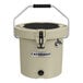 A tan CaterGator round outdoor cooler with a handle.