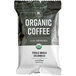 A Crown Beverages organic coffee bag with a white label.