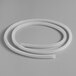 A white rubber gasket strip with curved edges on two ends.