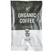 A Crown Beverages organic coffee bag with a green label.