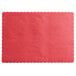 A red paper placemat with scalloped edges.
