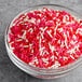 A bowl of Valentine's Day sprinkle mix.