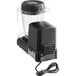 A black Vitamix blender with a clear container and a black lid, with a cord.