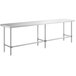 A long rectangular stainless steel work table with metal legs.