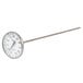 A Taylor round metal probe thermometer with a silver handle.