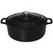 A black Chasseur enameled cast iron dutch oven with a lid.