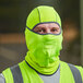 A man wearing a lime green Cordova Hi-Vis face mask.