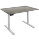 A Bridgeport gray Pro-Desk with a wooden top and white base.