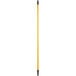 A long yellow Lavex threaded broom / squeegee handle with a black tip.