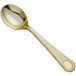 A Visions heavy weight gold plastic soup spoon with a handle.