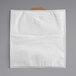 A white cloth bag with a brown handle.